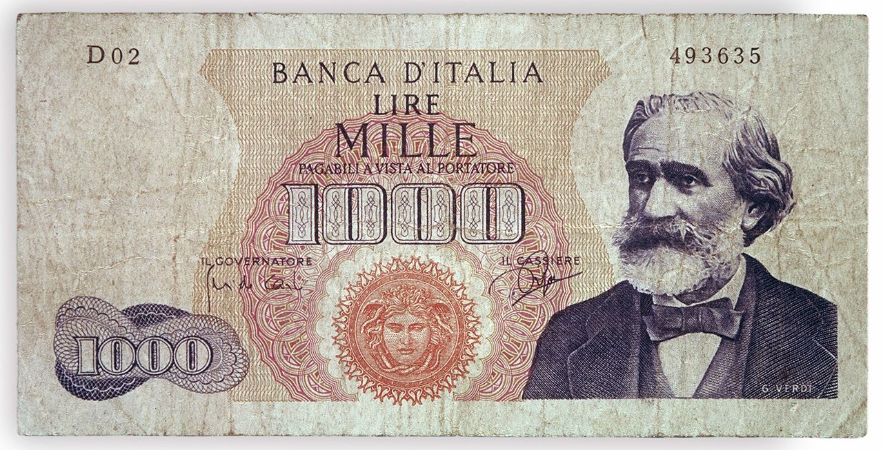 Italian banknote worth 1000 Liras, with the portrait of Giuseppe Verdi, musician. In the center in the red stamp the head of Medusa. Banknote in use around 1960-1965. 